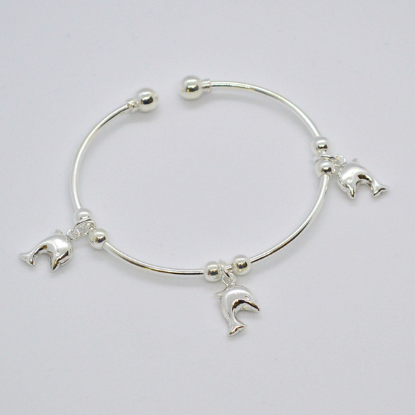 (2-0731-h8) Sterling Silver Dolphins Balance Bangle.